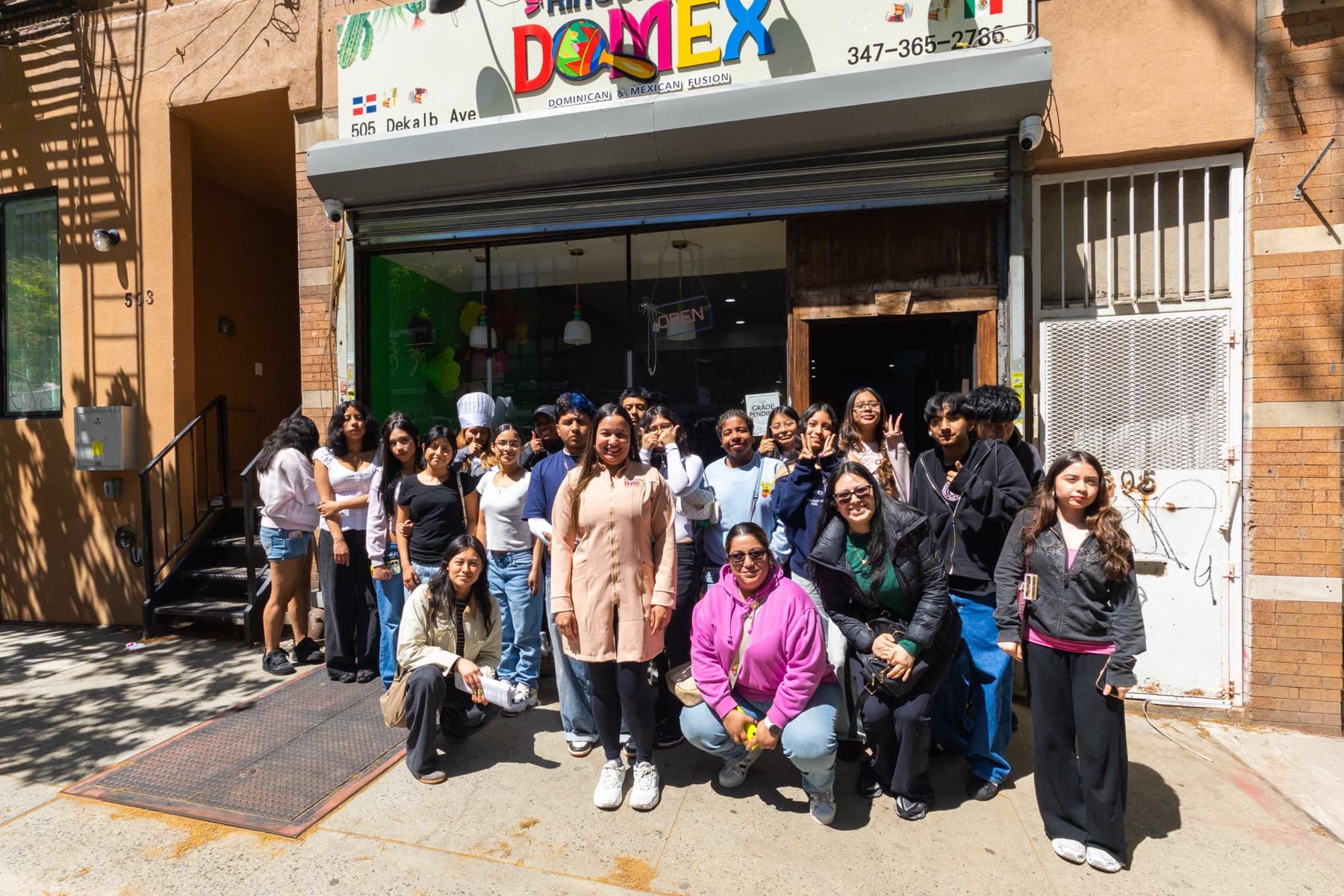 A group visit outside Rinconcito Domex