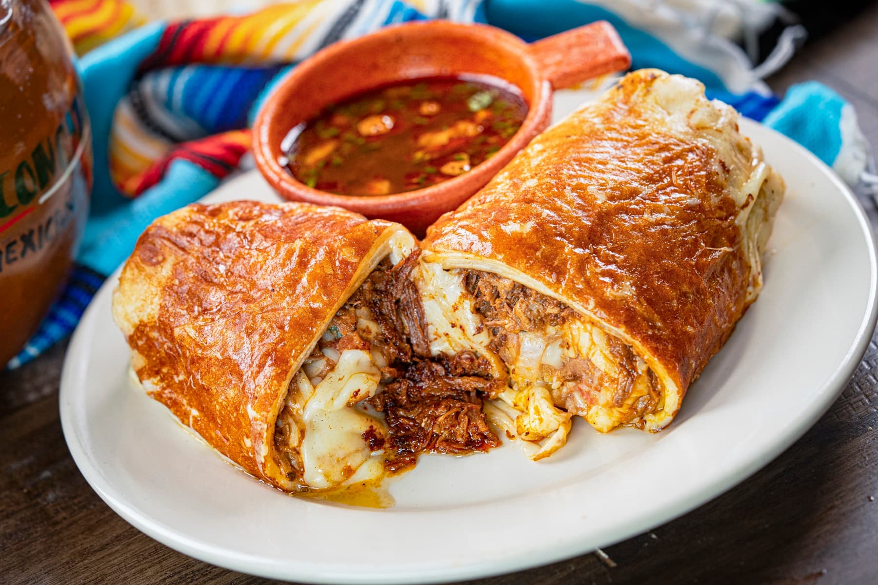 A Rinconcito Domex burrito with a richly filled center